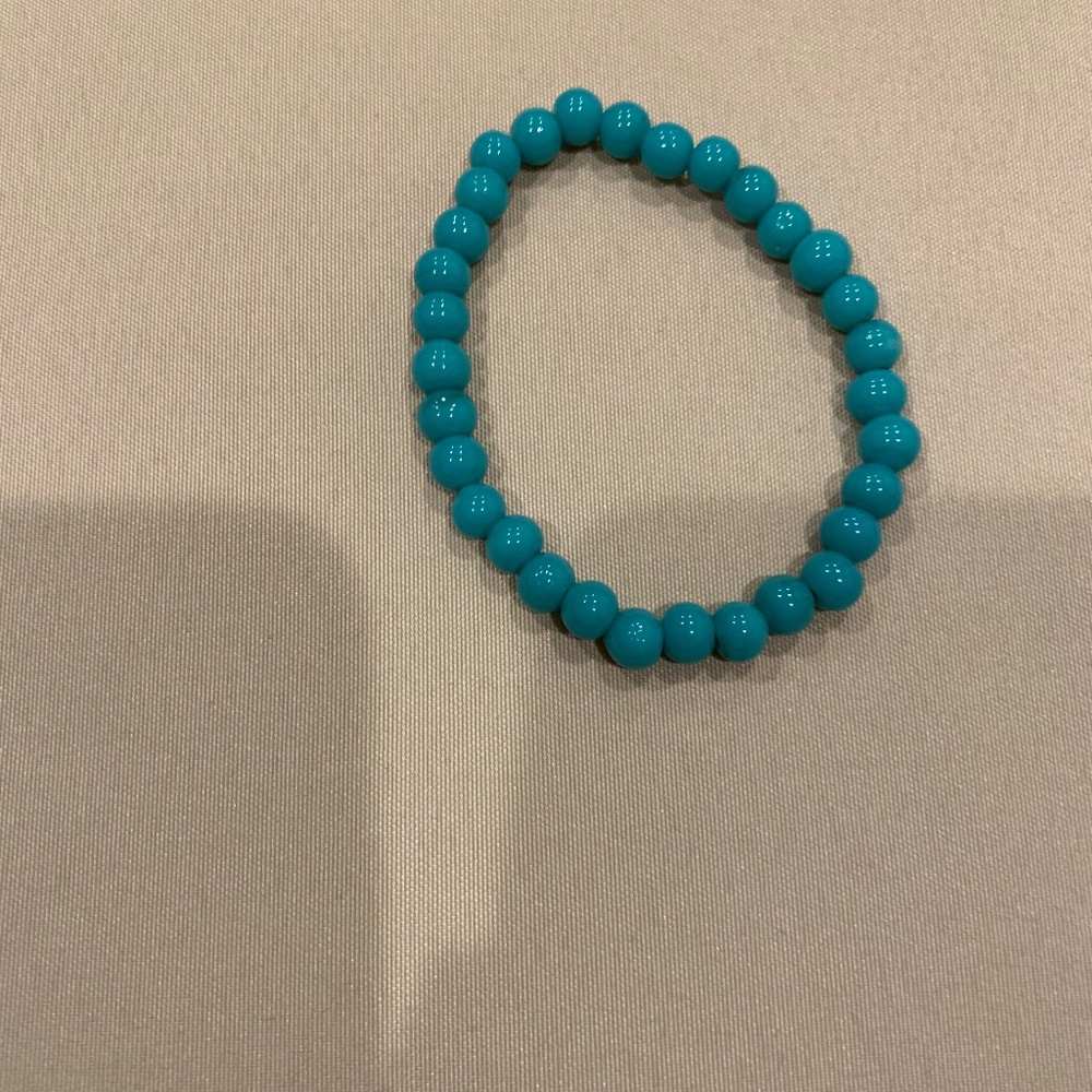 Stretch Bracelet w/  Turquoise Color Beads